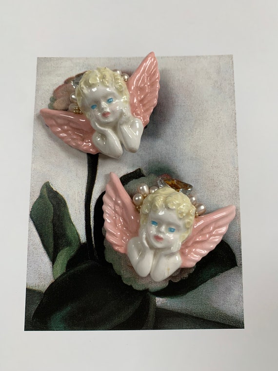 Cherub earrings by an iconic American designer Wen