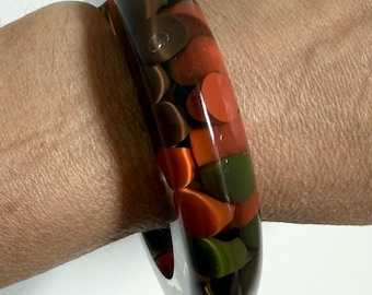 Unsigned Carlos Sobral green and orange polka dots lucite bracelet Pop Mod statement cuff bracelet by Brazilian designer in Paris