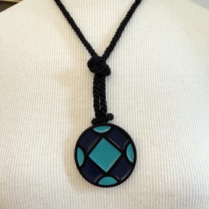 RARE Vintage YSL Saint Laurent Pendant in blue and turquoise on a black rope with tassels - signed couture French legacy house