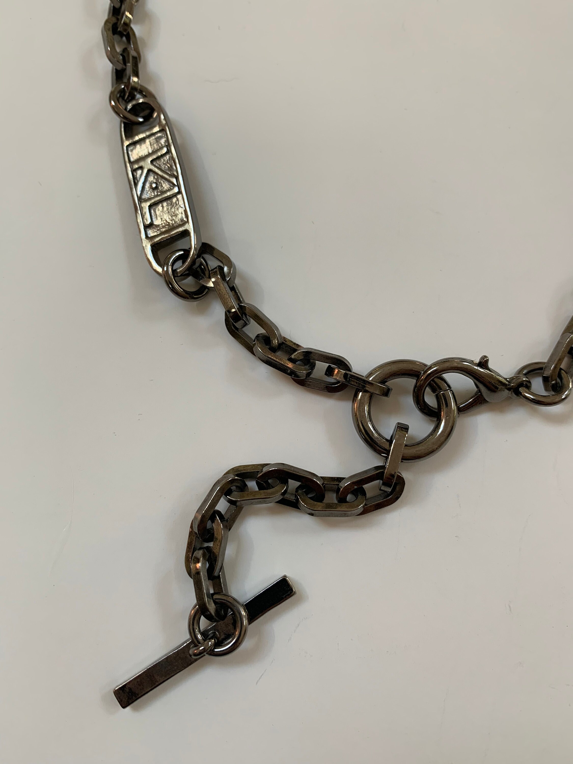 Rare Karl Lagerfeld Logo Necklace In Gun Metal Color With A Toggle And rare-karl-lagerfeld-logo-necklace-in-gun-metal-color-with-a-toggle-and