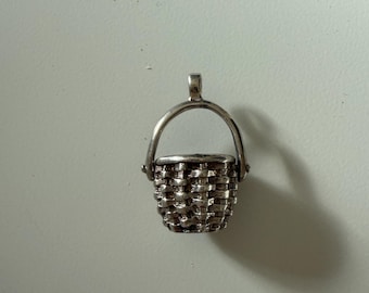 Vintage articulated charm/pendant in the shape of a cute basket modeled in silver marked 925 for sterling