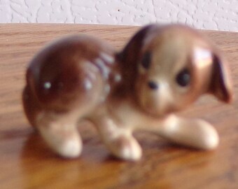 Retired Hagen Renaker Puppy Scratching