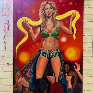 May include: A painting of a woman in a green and blue costume holding a yellow snake. She is performing on stage in front of a crowd. The background is red with yellow circles.