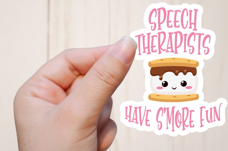 May include: A pink and white sticker with a cartoon s'more and the text "Speech Therapists Have S'more Fun".