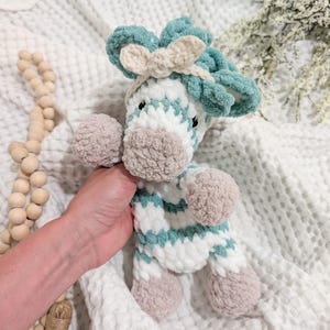 Crochet Zebra Snuggler: Handmade Soft Blanket Yarn Plush