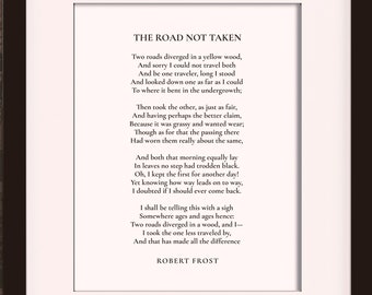 May include: A framed print of Robert Frost's poem "The Road Not Taken" with a white mat and black frame. The frame is 11 inches by 14 inches with an 8 inch by 10 inch mat opening.