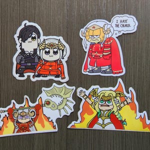Puede incluir: Un conjunto de cuatro pegatinas de dibujos animados con personajes en varias poses. Una pegatina muestra dos personajes, otra presenta un personaje con un bocadillo que dice "I HATE THE CHURCH". Las otras dos pegatinas muestran personajes con llamas.
