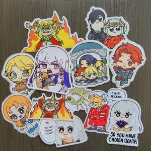 Puede incluir: Una colecci&oacute;n de pegatinas coloridas de estilo anime con varios personajes. Algunas pegatinas tienen texto, incluyendo "I HATE THE CHURCH", "AH You are Mother Fucker?" y "SO YOU HAVE CHOSEN DEATH". Las pegatinas est&aacute;n sobre una superficie de madera.