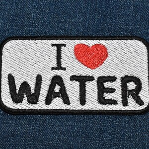 May include: White patch with black embroidered text "I love water" and a red heart.
