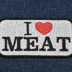 May include: White patch with black embroidered text "I love MEAT" and a red heart.