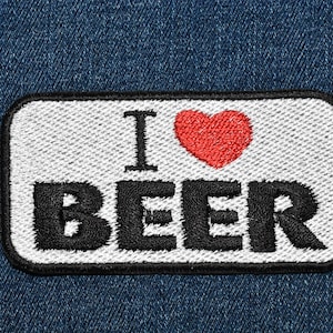 May include: White patch with black embroidered text "I love BEER" and a red heart.