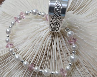 Pulsera elástica con dije de corazón y cuchara de la nobleza Royal Rose.