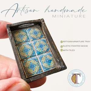May include: A miniature wooden tray with a rustic painted finish and blue and gold patterned tiles. The tray is handcrafted and perfect for dollhouse decor.