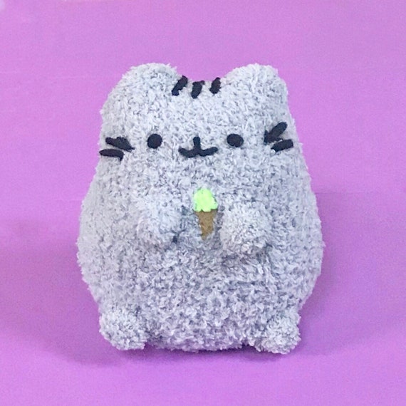 pusheen holding ice cream