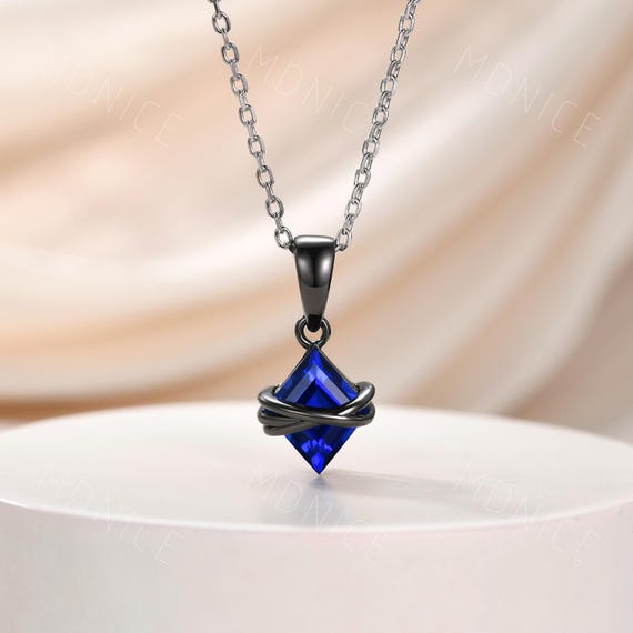 Lozenge Cut Sapphire Pendant: Black Gold Wire Wrapped Gothic