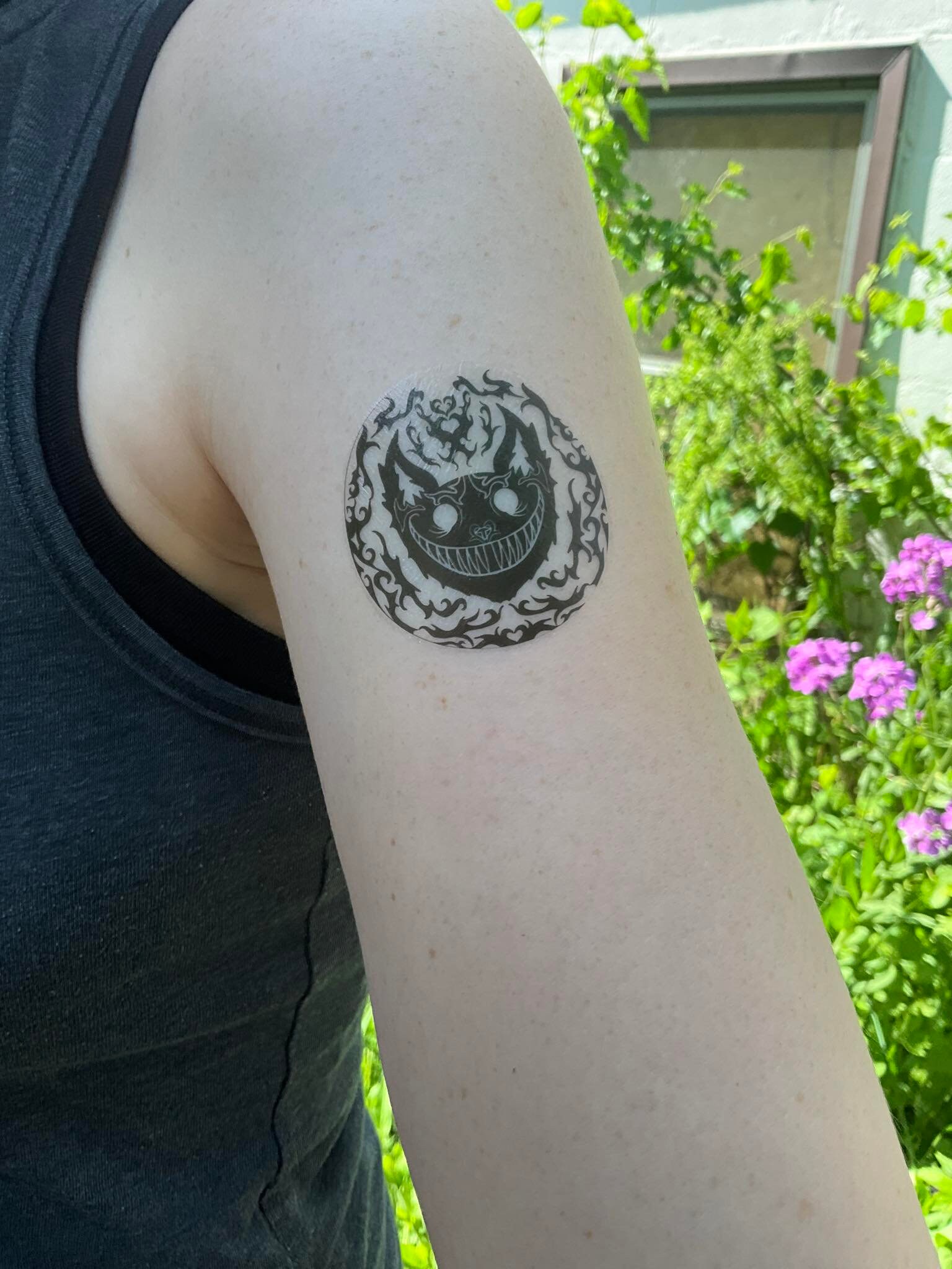 Dark cheshire cat tattoo | Orangetattooshop.com