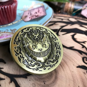 Creepy Cheshire Cat Alice in Wonderland 3D Challenge Coin Lovecraft Tentacle Design Antique Brass Finish Were All Mad Here Crazy Nerdy Gift