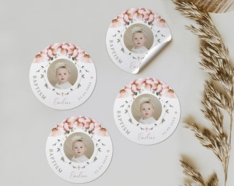 May include: Four round stickers with a floral design and a photo of a baby in the center. The stickers say "Baptism" and "Emilias" with the date "22.04.202X".