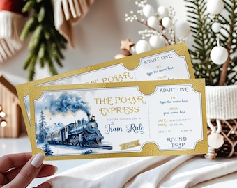 May include: Two gold-edged Polar Express train ride tickets. The tickets feature a blue train illustration with the text "The Polar Express" and "Train Ride". The tickets have space to add a name and date.