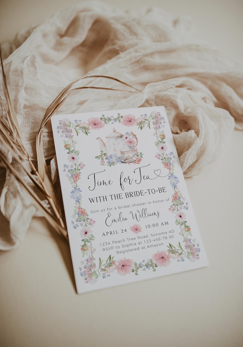 May include: A floral invitation for a bridal shower, featuring a teapot and teacup illustration. The text reads "Time for Tea" and includes the bride's name, date, time, and location. The design incorporates pink and blue flowers.