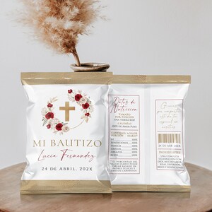 May include: A white rectangular snack bag with gold trim featuring a floral wreath, a gold cross, and the text MI BAUTIZO Lucia Fernandez 24 DE ABRIL 202X. The back includes a nutrition facts label with text in Spanish and a barcode.
