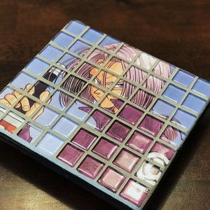 May include: A square mosaic tile coaster featuring a cartoon character with purple hair and a blue and purple outfit. The character is holding a weapon in their hand. The coaster has a blue and purple mosaic tile design.