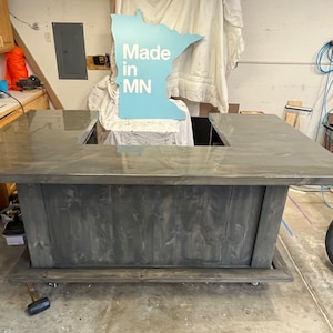 Custom U shape epoxy top wood bar. 7’x4’