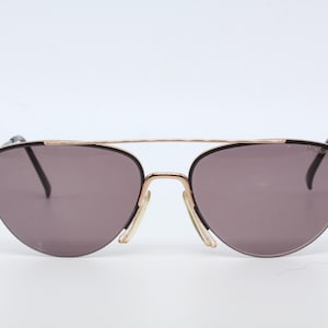 Gafas de sol vintage Movado by Carrera 5667