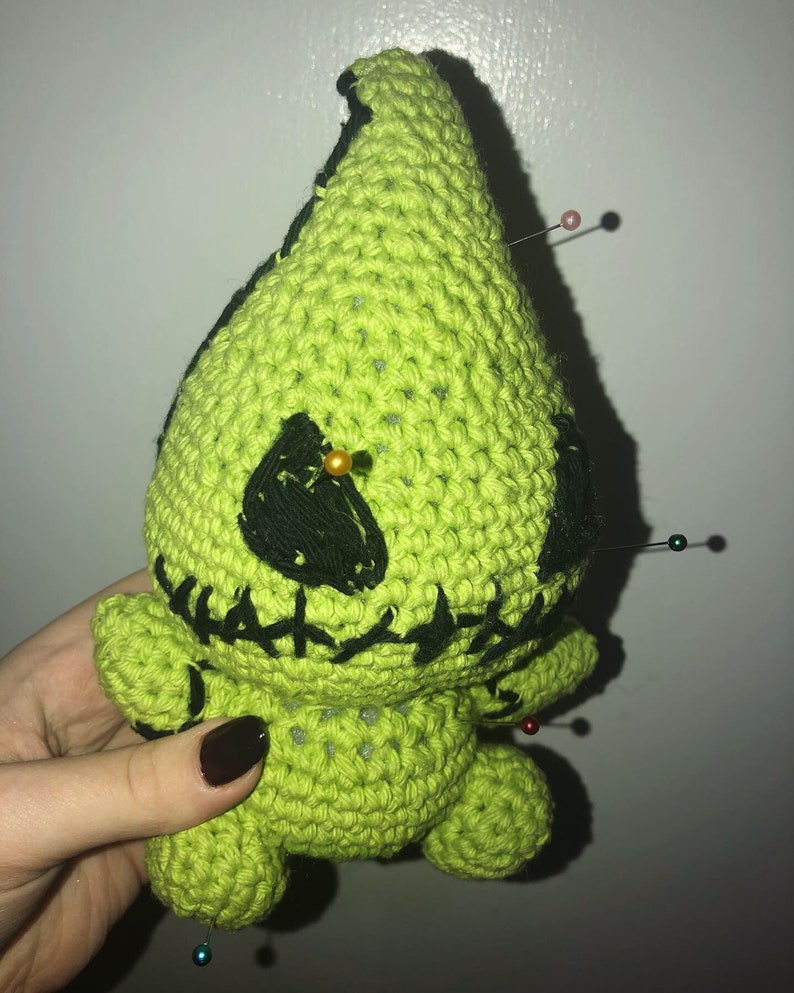 green voodoo doll