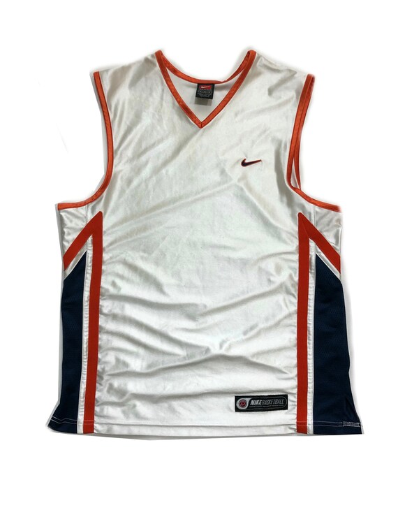 orange and white basketball jersey