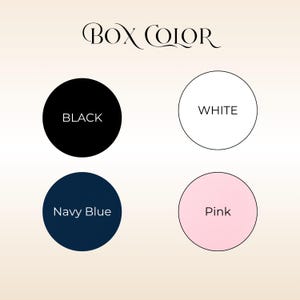 May include: A color chart titled BOX COLOR featuring four circles representing available options. The circles are labeled BLACK, WHITE, Navy Blue, and Pink, displaying their respective solid colors in a simple, clear, and organized layout.
