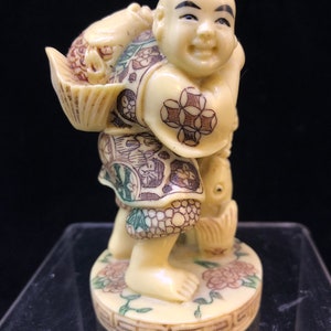 Vintage Japanse vis man beeldje snijwerk