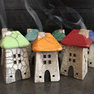 Raku ceramic little house cone incense burner with thatched roof in different colours by Nathalie Hamill