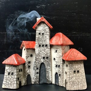 Raku little village with 5 houses with red roofs Nathalie Hamill