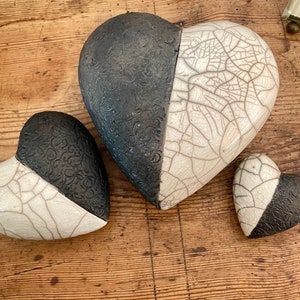 Pebble Raku black and white heart by Nathalie Hamill