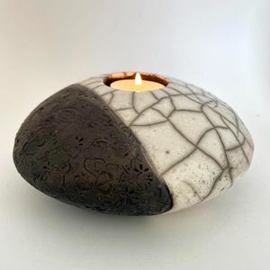 Raku black and white candle holder with patterned by Nathalie Hamill