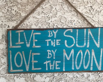 Live By The Sun, Love By The Moon Sign.