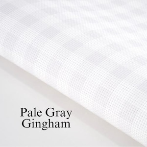 May include: Pale gray gingham fabric with a fine weave.