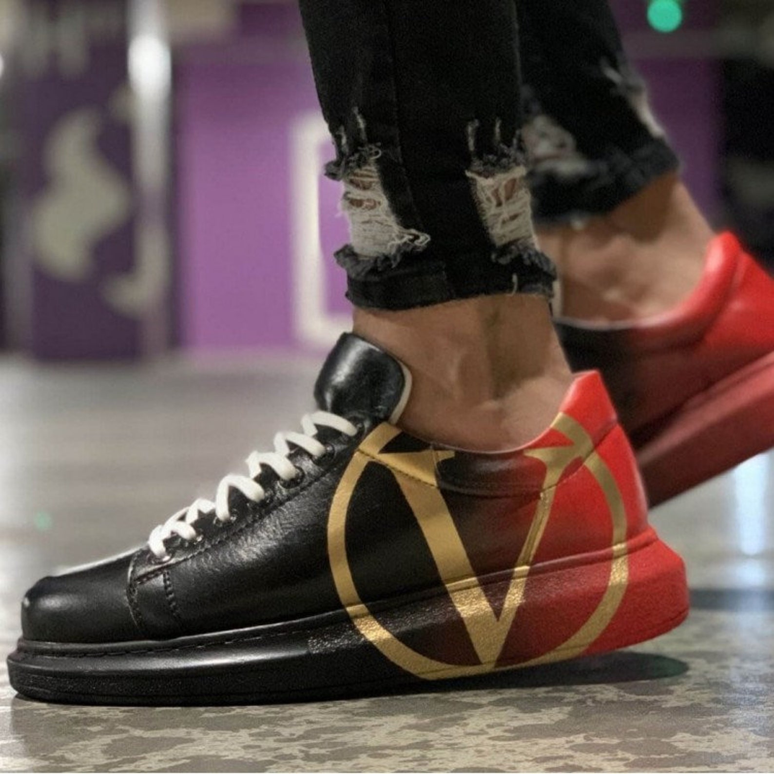 red and black canvas shoes