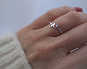 Silver airplane ring