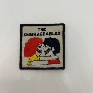 Vintage Patches Embroidered Iron on Sew on THE EMBRACEABLES Patch Logo