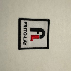 May include: White embroidered patch with a black and red Frito-Lay logo. The logo is a stylized "F" with a red "L" inside.