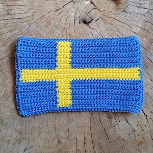 May include: A set of three ceramic mugs with a speckled, cream-colored glaze. Each mug features a different hand-painted floral design in shades of blue, green, and yellow. The mugs have a simple, rounded shape and a comfortable handle.