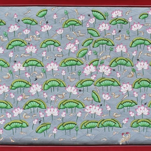 May include: A painting depicting a pond scene with pink lotus flowers, green lily pads, and gray birds. The background is a light blue color.
