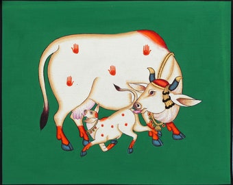 Traditional wall painting of cow and her calf for home decor.
