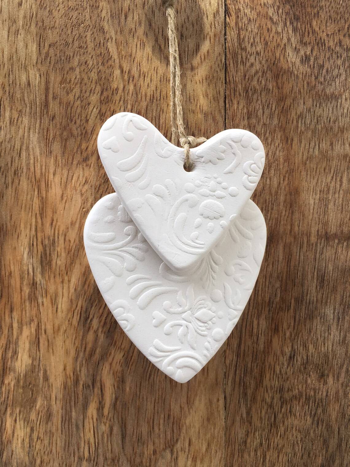 White ceramic hanging hearts with Caribbean blue pearl for Etsy