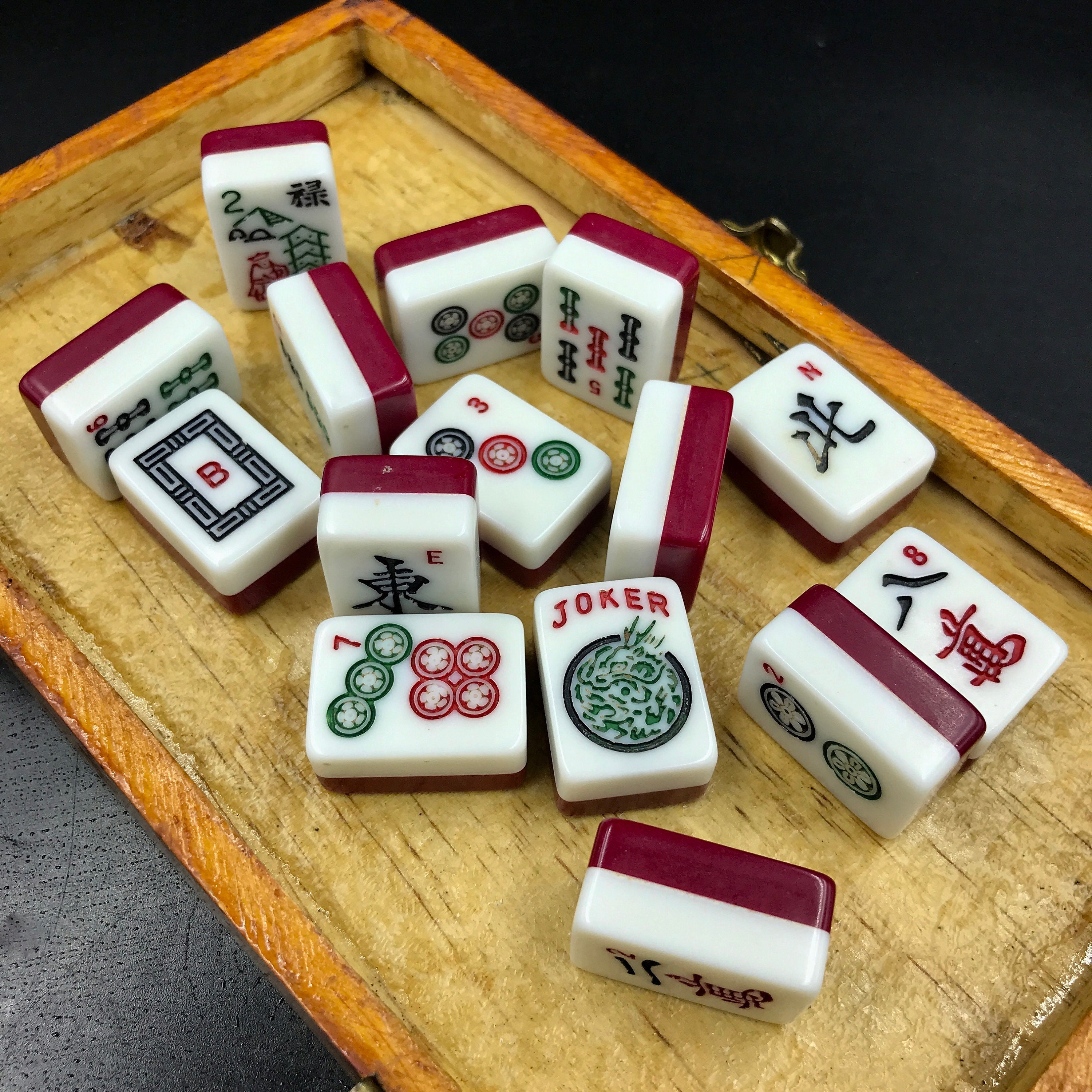 Colorful Chinese Mahjong Set with Tiles, Dice and Counters on