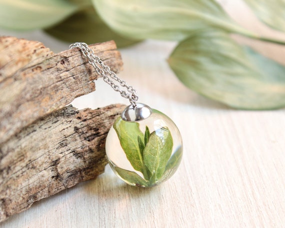 Fairy pendants made from dried plants and epoxy resin deals