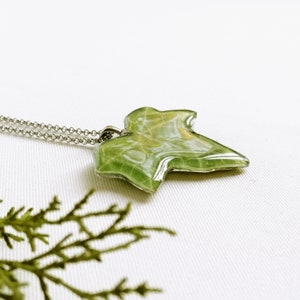 Beautiful real leaf necklace made of transparent resin with a little ivy leaf inside. This creation is inspired by Mother Nature in which a real leaf stands out in crystalline resin. Plated stainless steel chain. Magical spring inspiration.