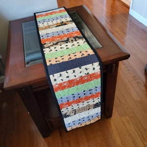 Quilted Halloween table runner,  october table topper, handmade fall decor, coffee table centerpiece, spiders, witch, pumpkins, cat  48&quot;x10&quot;